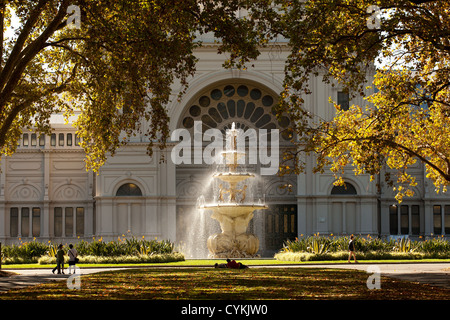 Avenue of tree's at the royal exhibition center, Carlton Gardens Melbourne Victoria Australia yellow golden leaves seasons Stock Photo