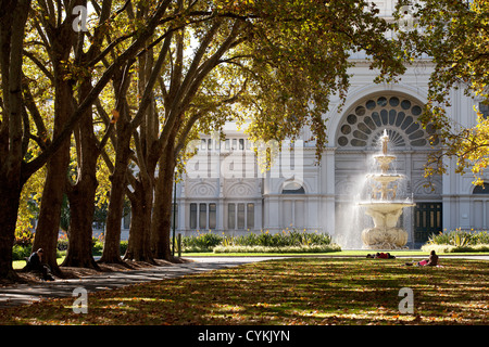 Avenue of tree's at the royal exhibition center, Carlton Gardens Melbourne Victoria Australia yellow golden leaves seasons Stock Photo