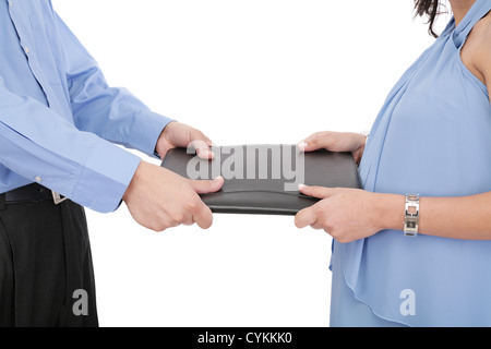 picture of two angry business person fighting for contract Stock Photo