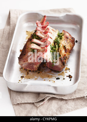 Roasted stuffed lamb racks in pan Stock Photo