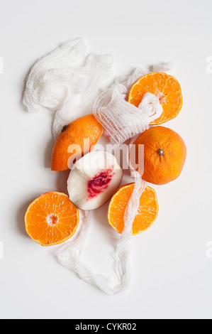 Orange fruit and twine Stock Photo