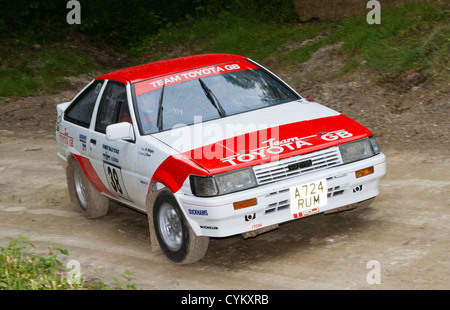 1984 Toyota Corolla 1.6 GT Coupe with driver John Midgley on the rally stage at the 2012 Goodwood Festival of Speed, Sussex, UK. Stock Photo