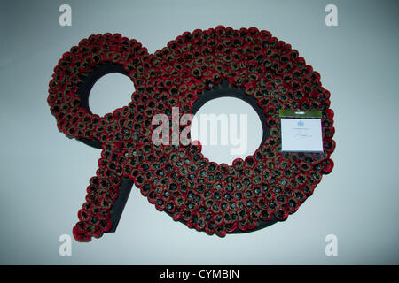 7th November 2012. London UK. Her Majesty The Queen visits the  Royal British Legion Poppy Factory to mark the 90th aniversary of the  British Legion. A wreath to mark 90 years signed by Princess Anne Stock Photo