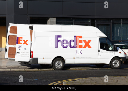 FedEx van delivering with back doors open, Scotland, UK Stock Photo