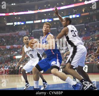 San Antonio Spurs center Boris Diaw, right, of France, shoots as Los ...