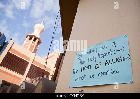 Poster outside Mosque in Dar Es Salaam 'By making fun of the holy prophet, the light of Allah cannot be diminished' Nov 2012 Stock Photo