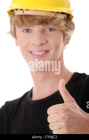 Young casual man in yellow helmet Stock Photo