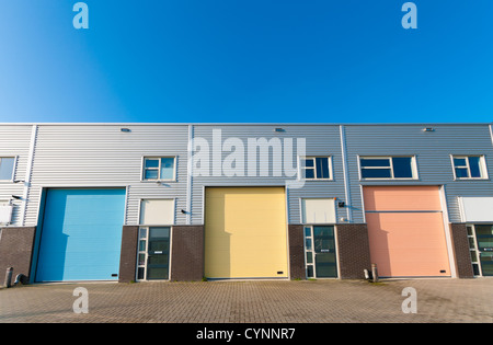 business units for small companies with colorful roller doors Stock Photo