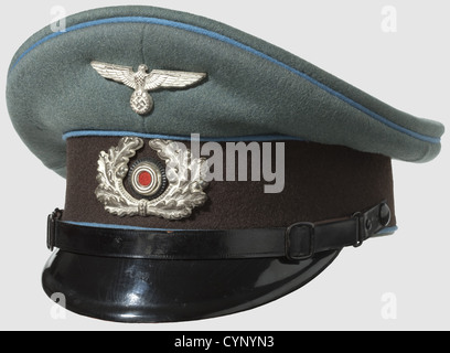 A visor cap for enlisted men/junior officers, of the Secret Field Police. Fine, field grey cloth with dark brown cap band, light blue piping and silvered metal insignia, silk liner with gold-stamped label 'Sonderklasse' and leather sweat band, historic, historical, 1930s, 1930s, 20th century, military police, field gendarmerie, police, gendarmerie, gendarmery, object, objects, stills, clipping, cut out, cut-out, cut-outs, NS, National Socialism, Nazism, Third Reich, German Reich, Germany, uniform, uniforms, clothes, Additional-Rights-Clearences-Not Available Stock Photo