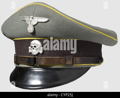 A visor cap for enlisted men/junior officers,of signal detachments. Field grey wool felt with black cap band,citron yellow piping,aluminium insignia and two-piece chin strap. Orange yellow silk cover liner with synthetic label,yellow linen side lining,leather sweat band. Signs of usage,small moth traces,uncleaned. A very rare cap,historic,historical,1930s,1930s,20th century,Waffen-SS,armed division of the SS,armed service,armed services,NS,National Socialism,Nazism,Third Reich,German Reich,Germany,military,militaria,utensil,piece of eq,Additional-Rights-Clearences-Not Available Stock Photo