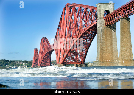 The Forth Railway Bridge pictured from the shore of the Firth of Forth at South Queensferry, Fife Scotland UK Stock Photo