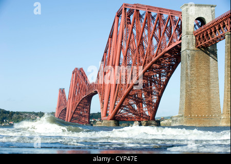 The newly painted (2012) Forth Bridge pictured from the shore of the Firth of Forth at South Queensferry, Fife Scotland. Stock Photo