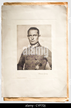 Friedrich Christiansen, the most successful naval aviator in World War I, large-sized dedication photograph of Hermann Göring, Christmas 1922, Half-length portrait on mount, Göring in field grey uniform with Pour le mérite and other decorations, 'Photographische Gesellschaft Berlin' titled 'Hermann Göring'. On the picture in purple indelible pencil 'In memory of the World War 14 - 18 and the killed aviation heroes - Hermann Göring Christmas 1922'. In silk paper and large protective cardboard box with an inventory label glued to the inside reading 'Fr. Christian, Stock Photo