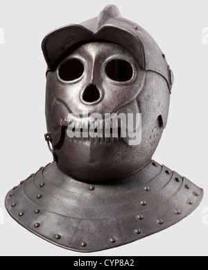 A cuirassier helmet with death's-head visor,This high quality piece was executed for a collector in the style of ca. 1620. The hammered two-piece skull with comb. Riveted notched eye-guard,the mask visor with medial ridge,the perforated bevor with latch hook. Articulated neck and nape ring of four plates. Dark,even patina. Height 34 cm,historic,historical,,17th century,defensive arms,weapons,arms,weapon,arm,fighting device,object,objects,stills,clipping,clippings,cut out,cut-out,cut-outs,utensil,piece of equipment,utensils,plating,armo,Additional-Rights-Clearences-Not Available Stock Photo