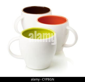 Three color coffee cups, isolated on white background Stock Photo
