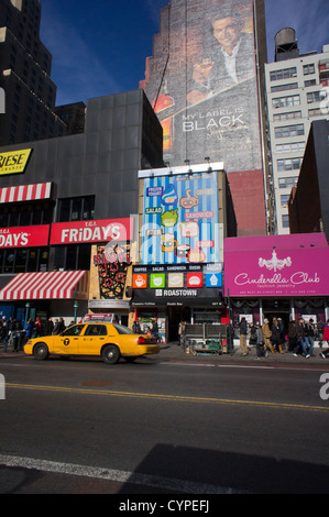 Restaurants and other businesses along West 34th Street in the Herald Square shopping district of New York Stock Photo