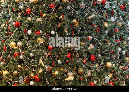 Christmas tree background with many decorations Stock Photo