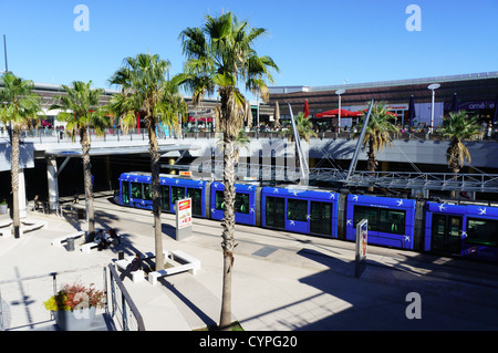 A tram at the stop in the new Odysseum shopping centre in Montpellier, France. Stock Photo