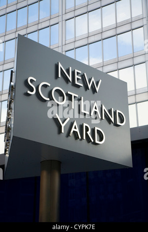 Famous spinning / rotating sign in front / outside of New Scotland Yard Metropolitan Met Police 's HQ / Head quarters. London UK Stock Photo