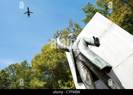 ARLINGTON, Virginia — The Theodore Roosevelt Memorial stands as a serene island amidst the Potomac River. The wooded 88-acre site, accessed by a footbridge, features a statue of the 26th president, surrounded by granite tablets inscribed with his notable quotations. Stock Photo