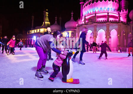 Brighton, UK. 8th Nov, 2012. Skaters of all ages enjoy the fun as the Royal Pavilion is transformed with the addition of an Ice Rink for the winter, Brighton November 8th 2012 phot Credit: Julia Claxton/Alamy Live News Stock Photo