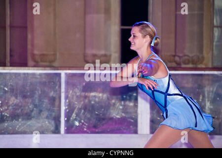 Brighton, UK. 8th Nov, 2012. British figure skater Kirstie Newbrook takes to the ice in front of a beautifully lit Brighton Pavilion as the Ice Rink opens in Brighton November 8th 2012 phot Credit: Julia Claxton/Alamy Live News Stock Photo