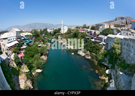 Mostar and the Neretva River in Bosnia and Herzegovina. Seen from the Old Bridge. Stock Photo