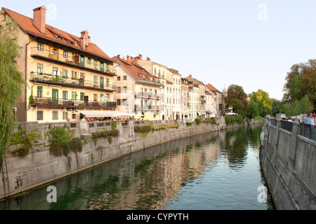 Old buildings on the banks of the Ljubljanica River in Ljubljana, the capital of Slovenia. Stock Photo