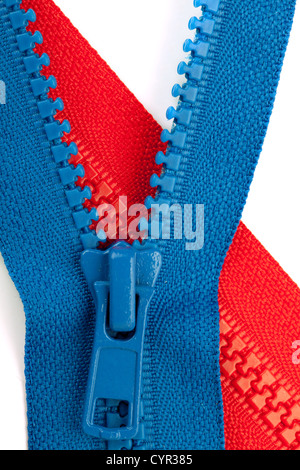 Blue and red zippers closeup. On white background Stock Photo