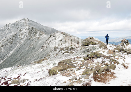 Lone hiker on the Franconia ridge trail, New Hampshire, USA. Stock Photo
