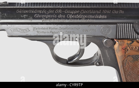 Walther PPK ZM,RZM,honour prize for SA Section Hochland,7.65 mm cal,no.266785K.Bright bore.Proof mark: eagle/'N'.On left side of slide standard inscription scaled down and moved to the left,on its right encircled 'RZM' logo for 'Reichszeugmeisterei'.On top of this factory engraving 'Skiwettkämpfe der SA - Gruppe Hochland 1941 GaPa / Ehrenpreis des Oberbürgermeisters / Reichsleiter Karl Fiehler'.Complete,original,high gloss finish partially lightly spotted.Small parts blued.Brown-mottled plastic grip panel.Magazine with extension.Comes with alum,Additional-Rights-Clearences-Not Available Stock Photo