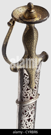 A silver-inlaid Indian tulwar, 19th century. Curved blade of welded ...