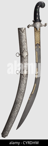 An Ottoman presentation kilij set with diamonds and emeralds,Sultan Mahmud II(r.1808-1839)Blade of the finest dark wootz-Damascus,cut on the back,and with a broadened double-edged point.Both sides of the forte cut with geometric arabesque-shaped designs against a gilt background.Three cartouches on each side along the spine of the blade with gold inlaid scroll decoration as well as a Koranic inscription on the obverse side.The silver cross-piece bears twelve diamond roses set in gold and three cabochon-cut emeralds.The Indian black jade grip inlaid wi,Additional-Rights-Clearences-Not Available Stock Photo