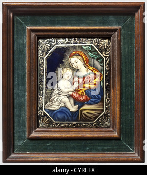 Mary and child,Limoges,18th century Cambered copper plate with fine polychrome,enamel painting. Portrayal of the seated Mother of God with the Infant Jesus on her knees,a flower in the left hand. Surrounded by chased vine work on a black background. An attachment hole on both the upper and lower rims. Molded walnut frame,partially covered with green velvet. Picture dimensions 13 x 10.7 cm. Frame dimensions 22.5 x 20 cm,historic,historical,18th century,handicrafts,handcraft,craft,object,objects,stills,clipping,clippings,cut out,cut-out,cut-out,Additional-Rights-Clearences-Not Available Stock Photo
