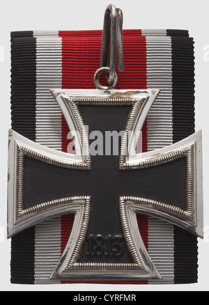 A Knight's Cross of the Iron Cross of 1939,in case Blackened iron core with rim-high swastika,the silver frame with onset eyelet and polished edges,the lower eyelet reverse punched with a small '800'. With a 54 cm length of neck ribbon. Typical mid-war issue by Steinhauer & Lück. 48.1 x 53.7 mm. Weight 30.2 g(Nie 7.03.08). Black award presentation case with magnetic fittings,a tear in the white silk cover liner where it overlaps the black velvet insert,historic,historical,1930s,20th century,awards,award,German Reich,Third Reich,Nazi era,National ,Additional-Rights-Clearences-Not Available Stock Photo