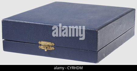 Adolf Hitler,an award case for the oversized amber edition of 'Mein Kampf' Dark blue linen cover,the interior lined in white silk and blue velvet. The inside cover and base show pressure marks from the decorative pins and national eagle. 30 x 24.6 x 8 cm. Appropriate size and type presentation case for the amber edition issued prior to 1938,historic,historical,1930s,20th century,NS,National Socialism,Nazism,Third Reich,German Reich,Germany,German,National Socialist,Nazi,Nazi period,fascism,object,objects,stills,clipping,clippings,cut out,,Additional-Rights-Clearences-Not Available Stock Photo