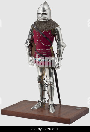 Peter Wroe - A fine North Italian miniature full harness,in the style of 1380 - 1390,20th century Accurately represented to scale in white metal alloy,leathered and highly detailed throughout,partly articulated,including bascinet with 'houndskull' visor and aventail of iron and brass rings,cuirass and tonlet covered with red suede leather studded with decorated rivets,'hourglass' gauntlets,mail shirt and rowel spurs. Leather covered shield,dagger,arming sword. On its leather covered figural stand with carved resin face,the base inset with the maker's,Additional-Rights-Clearences-Not Available Stock Photo