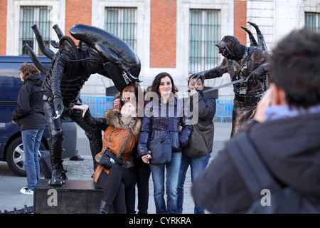 Living statues, street entertainers, space monsters, posing pose for tourist photographs, Sol Plaza, Square, Madrid, Spain Stock Photo