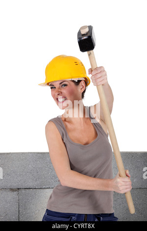 Bricklayer  holding hammer Stock Photo