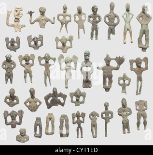 Collection of West Asian(steppe tribal)votive figures,8th-6th century B.C. Cast of solid bronze and lead,the patina varying. Consisting of 33 different figures(partially incomplete)and figure parts with raised hands or hands held in front of the abdomen. Heights between 1.8 and 6.3 cm. Cf. Archäologie der Sowjetunion vom Altertum bis zum Mittelalter,Bronzezeit Mittelasiens und des Kaukasus(1992),fig. 50 ff. Provenance: South German private collection,1970s and later,historic,historical,20th century,ancient world,ancient world,ancient times,obje,Additional-Rights-Clearences-Not Available Stock Photo