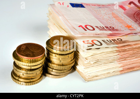 Euro paper money and coins Stock Photo
