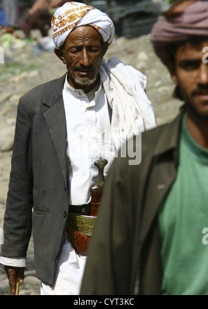 Portrait of two Yemeni men wearing traditional clothing and displaying