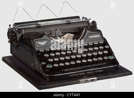 Gertraud 'Traudl' Junge(1920 - 2002),a Continental typewriter with 4 mm antiqua font for Adolf Hitler Wanderer Works,Siegmar-Schönau,registration number 'R348995'. Black varnished housing,keys functional,complete with colour ribbon. The letters are in special issue 4 mm size,to correct for Hitler's hyperopia(see also Hitler's reading glasses,Lot xxxx). In the original case,dimensions ca. 33 x 33 x 14 cm. Provenance: Haucke Collection,Wolfenbüttel. Included is an in-depth,signed letter from Traudl Junge to Haucke dated 1970,wherein she gives thanks ,Additional-Rights-Clearences-Not Available Stock Photo