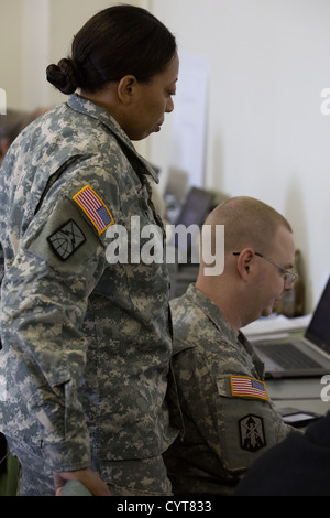 Federal Employees at work in Initial Operating Facility on response and recovery from Hurricane Sandy. Stock Photo