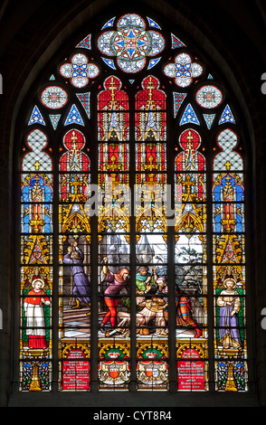 BRUSSELS - JUNE 22: Windowpane in main nave of Saint Michael and Saint Gudula gothic cathedral by J.B. Capronnier from 19th cent Stock Photo