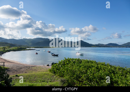 View in St Martin, St Maarten at Baie de l'Embouchure with boats moored in lines, Caribbean Stock Photo