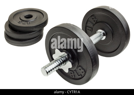 cast iron dumbbell and weight plates isolated on white background Stock Photo
