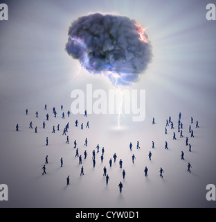 Tiny people walking into a brain storm Stock Photo