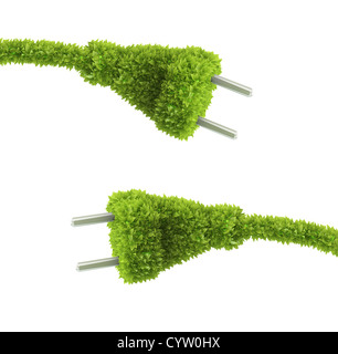 Grass covered electrical plug - renewable energy concept Stock Photo