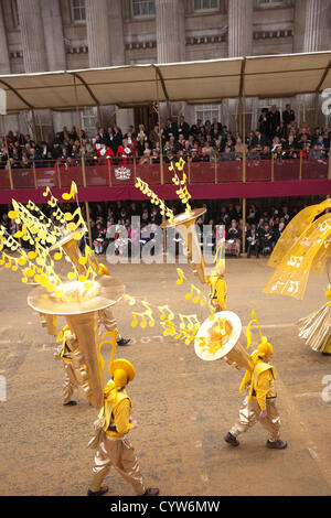 The Lord Mayor's Show Saturday 10 November 2012. Mansion House, City of London, UK. Picture shows performers at The Lord Mayor's Show outside Mansion House, where Alderman Roger Gifford begins his role as The Lord Mayor, who serves a one-year, unpaid term, plays an ambassadorial role for the Square Mile, typically spending three months abroad promoting the finance industry as well as receiving delegations in London, City of London, England, UK. Stock Photo